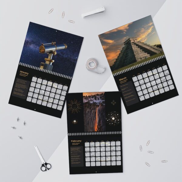 Three different calendars on a table with scissors and other items.
