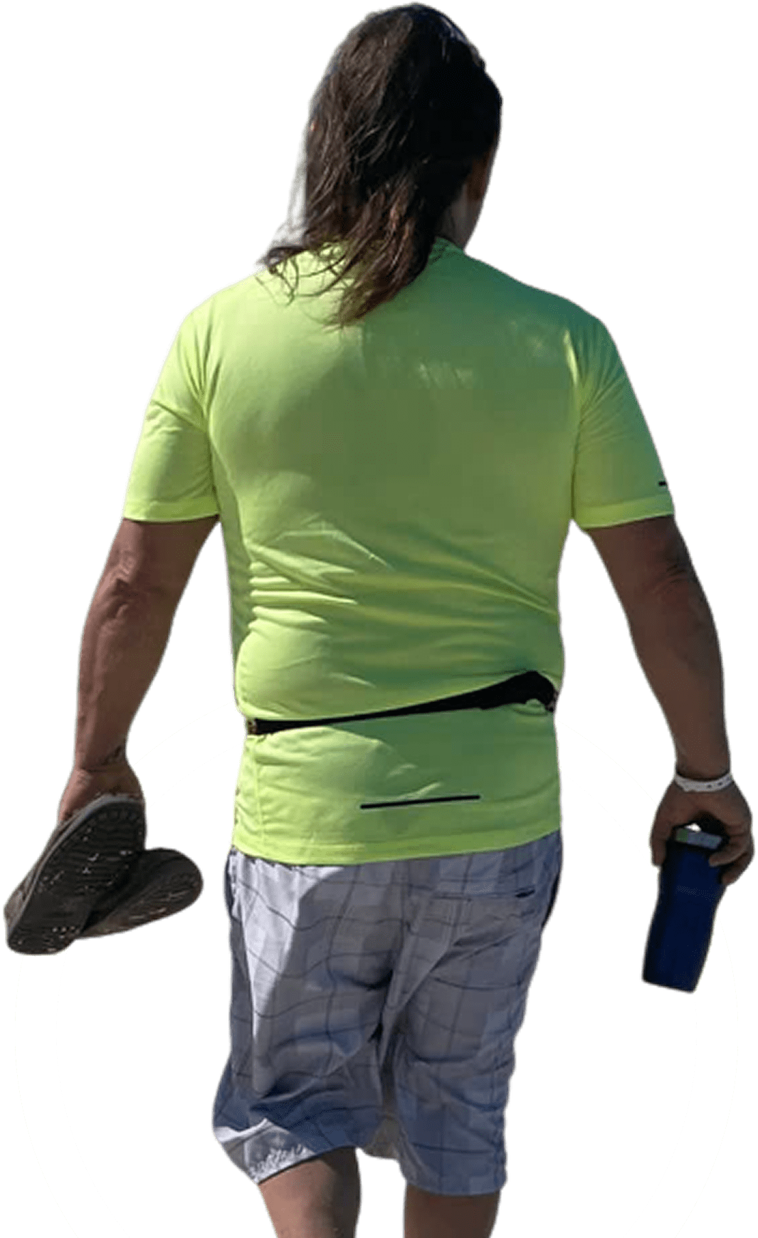 Group 1321314600 A man in a yellow shirt holding something.